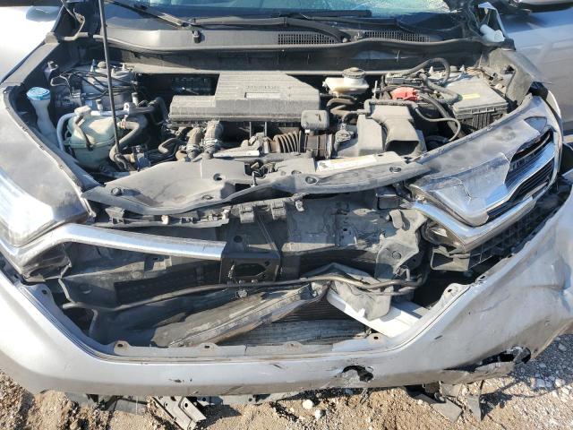 Photo 12 from auction – 2018 HONDA CR-V with VIN 7FARW2H95JE097594