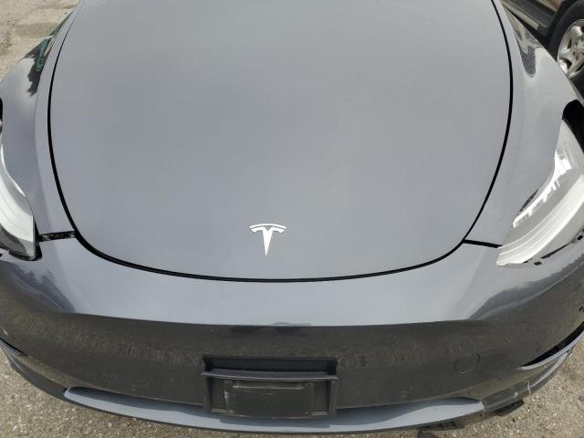 Photo 12 from auction – 2022 TESLA MODEL Y with VIN 7SAYGDEE8NF308667