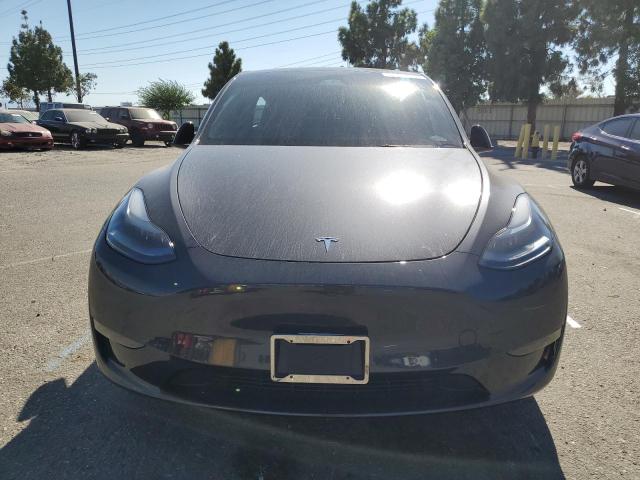 Photo 5 from auction – 2025 TESLA MODEL Y with VIN 7SAYGDEF9SF311551