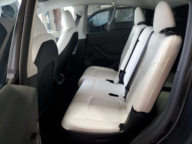 Photo 11 from auction – 2024 TESLA MODEL Y with VIN 7SAYGAEE6RF037080