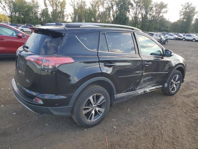 Photo 3 from auction – 2017 TOYOTA RAV4 XLE with VIN 2T3RFREV7HW682235