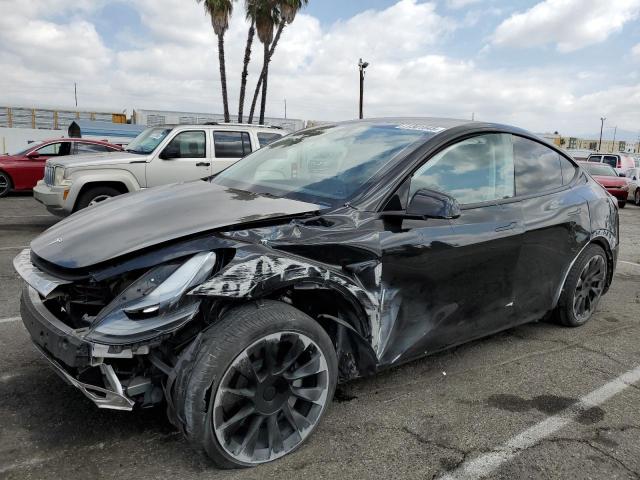TESLA MODEL Y 2023 with VIN 7SAYGDED1PF941165 - Photo from auction