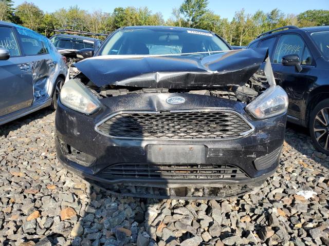 Photo 5 from auction – 2015 FORD FOCUS SE with VIN 1FADP3K20FL232303