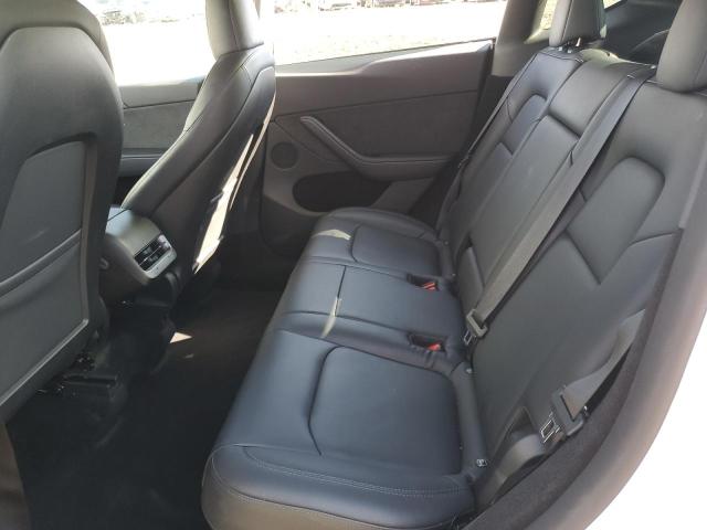 Photo 11 from auction – 2023 TESLA MODEL Y with VIN 7SAYGDEE0PA128681