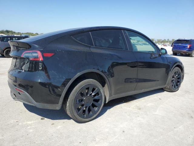 Photo 3 from auction – 2023 TESLA MODEL Y with VIN 7SAYGDEE0PA052475