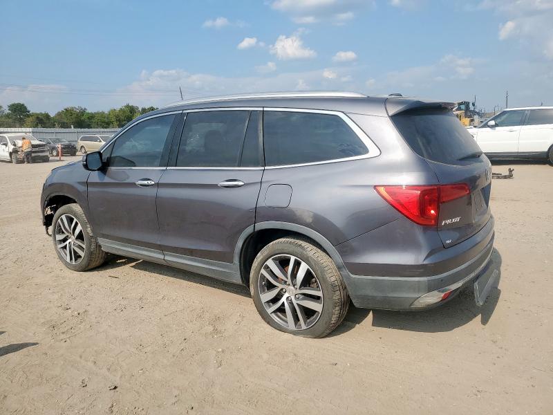 Photo 2 from auction – 2017 HONDA PILOT TOUR with VIN 5FNYF6H97HB007001