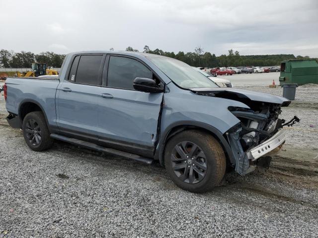 Photo 4 from auction – 2023 HONDA RIDGELINE with VIN 5FPYK3F15PB050958