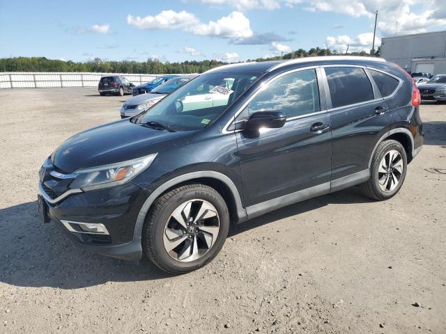 HONDA CR-V TOURI 2016 with VIN 5J6RM4H97GL089929 - Photo from auction