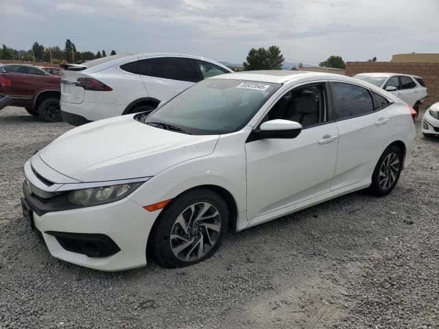 HONDA CIVIC EX 2016 with VIN 2HGFC2F84GH573517 - Photo from auction
