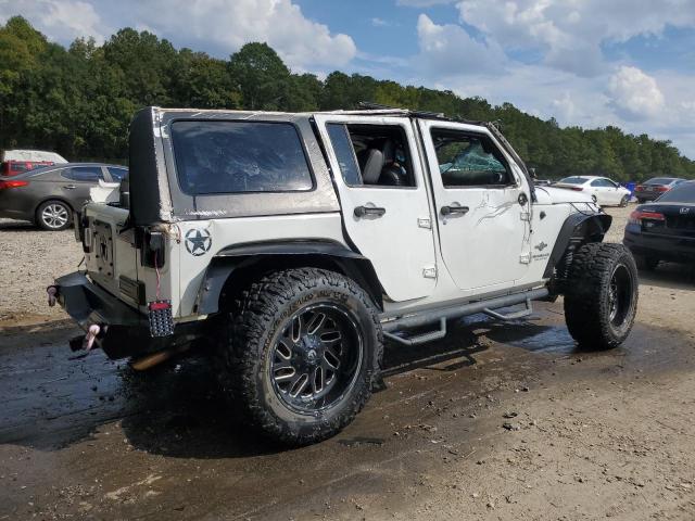 Photo 3 from auction – 2014 JEEP WRANGLER U with VIN 1C4BJWDG5EL213662
