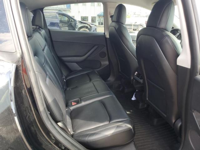Photo 10 from auction – 2022 TESLA MODEL Y with VIN 7SAYGDEE6NF385358