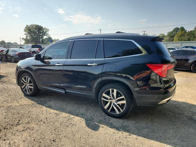 Photo 2 from auction – 2016 HONDA PILOT TOURING with VIN 5FNYF6H95GB004841