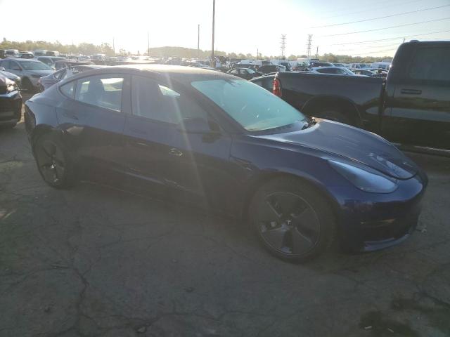 Photo 4 from auction – 2022 TESLA MODEL 3 with VIN 5YJ3E1EB9NF323891