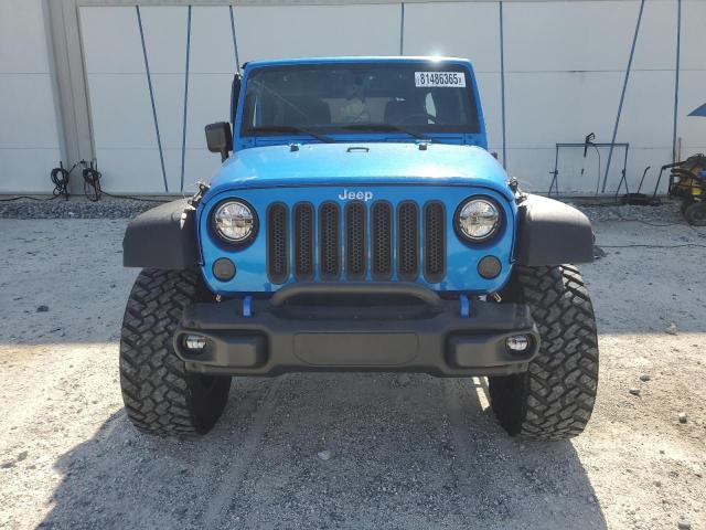 Photo 5 from auction – 2016 JEEP WRANGLER U with VIN 1C4BJWDG7GL176116
