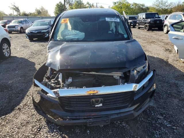 Photo 5 from auction – 2023 HONDA RIDGELINE with VIN 5FPYK3F74PB036196