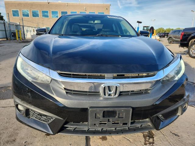 Photo 5 from auction – 2018 HONDA CIVIC TOUR with VIN 2HGFC1F96JH642203
