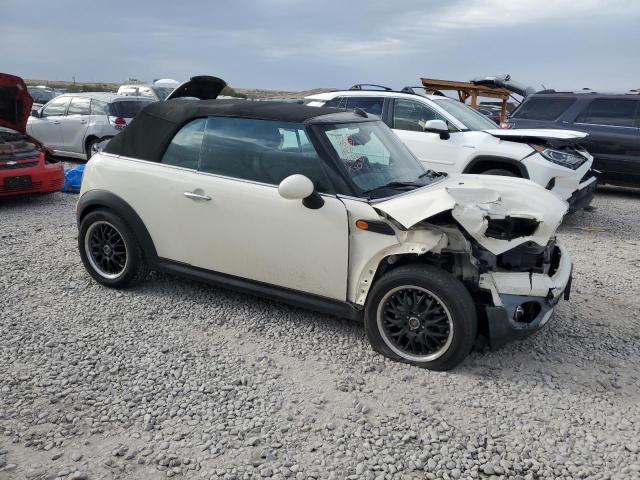 Photo 4 from auction – 2009 MINI COOPER with VIN WMWMR335X9TU95543