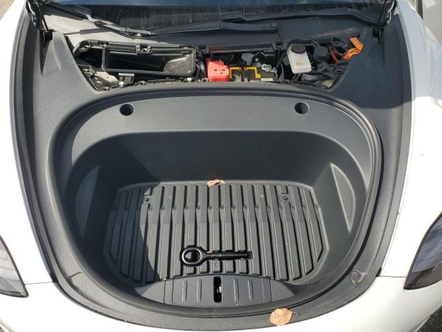 Photo 11 from auction – 2021 TESLA MODEL 3 with VIN 5YJ3E1EB7MF068740