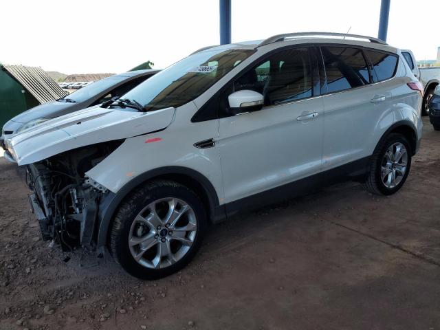 FORD ESCAPE TIT 2014 with VIN 1FMCU0JX9EUB99493 - Photo from auction