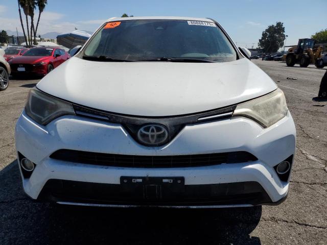 Photo 5 from auction – 2017 TOYOTA RAV4 XLE with VIN JTMWFREV2HJ718284