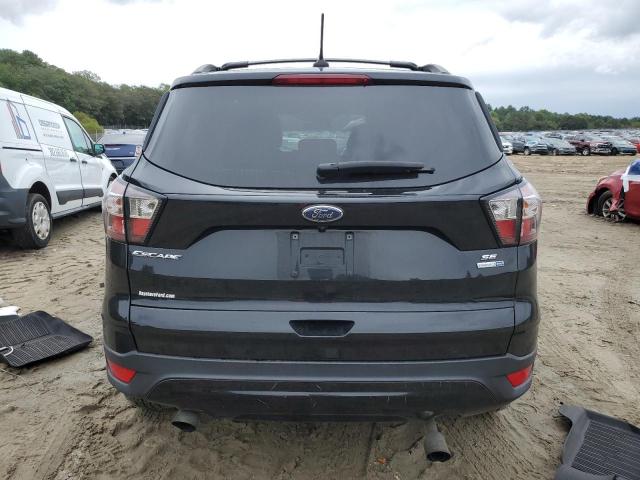 Photo 6 from auction – 2018 FORD ESCAPE SE with VIN 1FMCU9GD5JUA39333