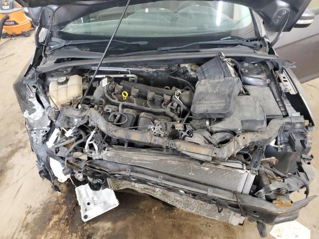 Photo 11 from auction – 2013 FORD FOCUS SE with VIN 1FADP3F20DL291701