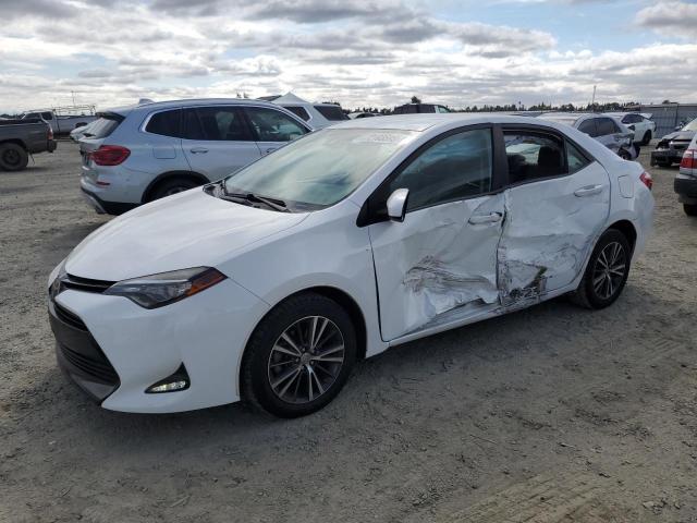 TOYOTA COROLLA L 2017 with VIN 5YFBURHE2HP633652 - Photo from auction