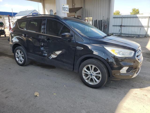 Photo 4 from auction – 2017 FORD ESCAPE SE with VIN 1FMCU0GD2HUD08653