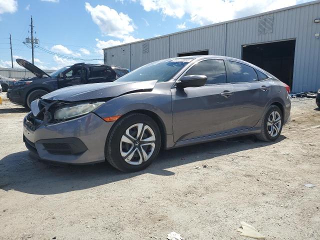 HONDA CIVIC LX 2016 z numerem VIN 19XFC2F59GE034228 - Zdjęcie z aukcji