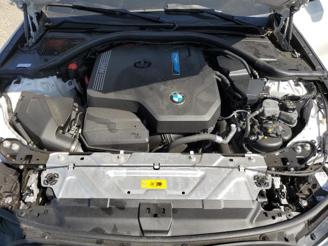 Photo 11 from auction – 2023 BMW 330E with VIN 3MW39FF06P8C94403
