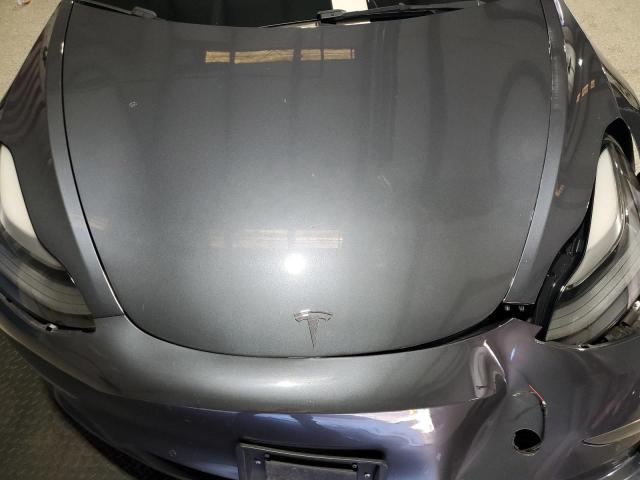 Photo 11 from auction – 2022 TESLA MODEL 3 with VIN 5YJ3E1EA6NF370688