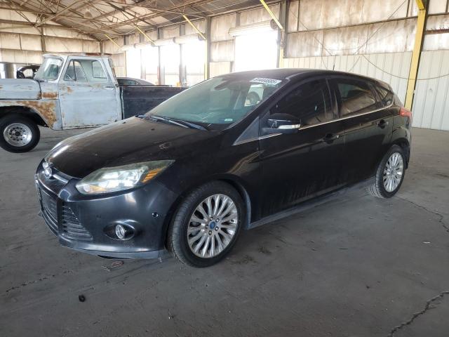 FORD FOCUS TITANIUM 2012 with VIN 1FAHP3N21CL290526 - Photo from auction