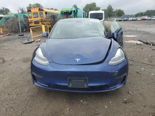 Photo 5 from auction – 2021 TESLA MODEL 3 with VIN 5YJ3E1EB8MF978929