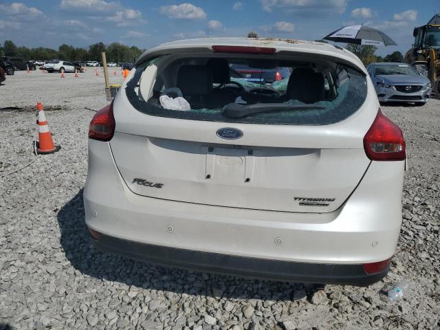 Photo 6 from auction – 2016 FORD FOCUS TITANIUM with VIN 1FADP3N29GL303527