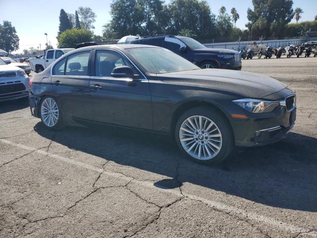 Photo 4 from auction – 2015 BMW 3-SERIES SEDAN with VIN WBA3C1C56FP853372