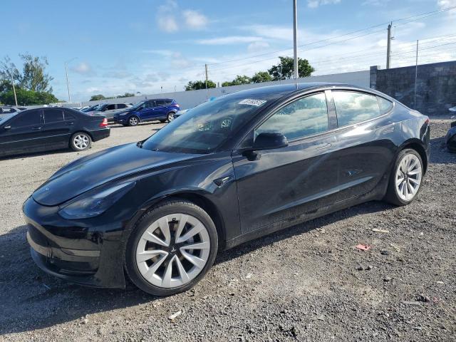 TESLA MODEL 3 2021 with VIN 5YJ3E1EA2MF018092 - Photo from auction