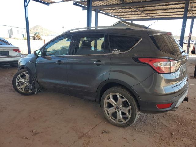 Photo 2 from auction – 2017 FORD ESCAPE TIT with VIN 1FMCU9J96HUD28588