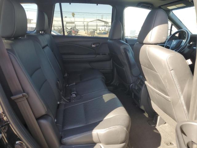 Photo 11 from auction – 2020 HONDA PASSPORT E with VIN 5FNYF8H58LB009146