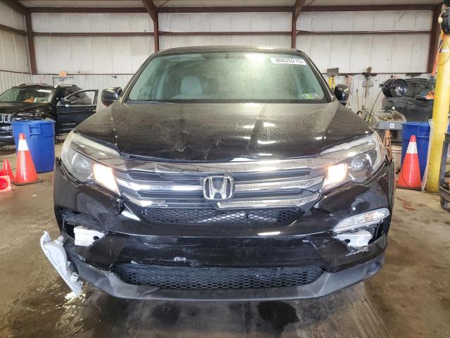 Photo 5 from auction – 2018 HONDA PILOT LX with VIN 5FNYF6H15JB020863