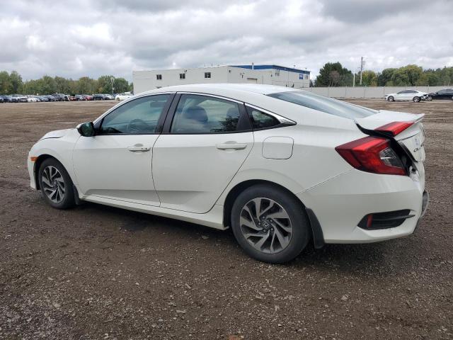 Photo 2 from auction – 2018 HONDA CIVIC LX with VIN 2HGFC2F66JH031115