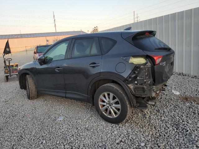 Photo 2 from auction – 2016 MAZDA CX-5 TOURI with VIN JM3KE4CY9G0908712