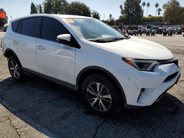 Photo 4 from auction – 2017 TOYOTA RAV4 XLE with VIN JTMWFREV2HJ718284