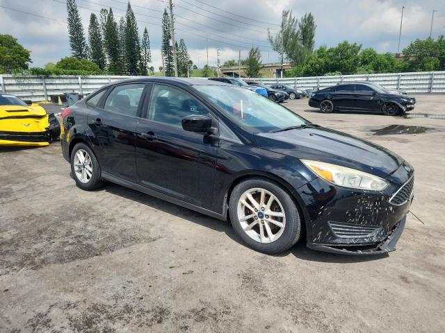 Photo 4 from auction – 2018 FORD FOCUS SE with VIN 1FADP3F2XJL315949