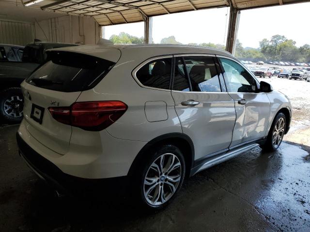 Photo 3 from auction – 2016 BMW X1 XDRIVE2 with VIN WBXHT3C30G5F65563