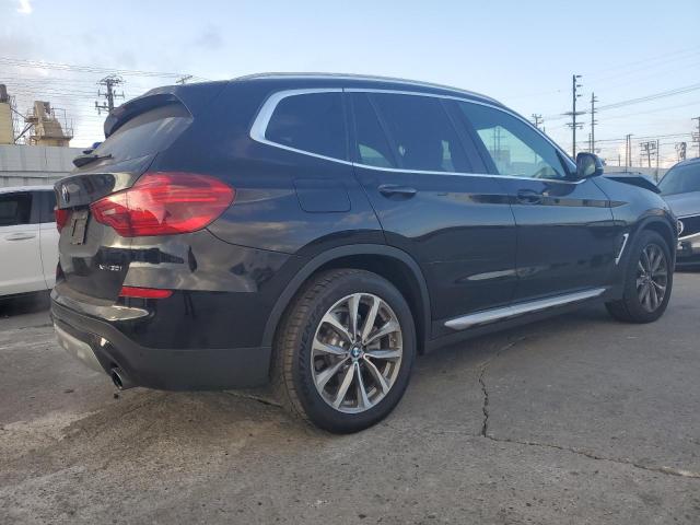Photo 3 from auction – 2019 BMW X3 XDRIVE3 with VIN 5UXTR9C56KLP90998