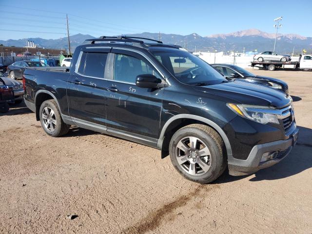 Photo 4 from auction – 2019 HONDA RIDGELINE with VIN 5FPYK3F59KB011141