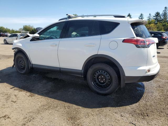 Photo 2 from auction – 2018 TOYOTA RAV4 LE with VIN 2T3BFREV6JW698949