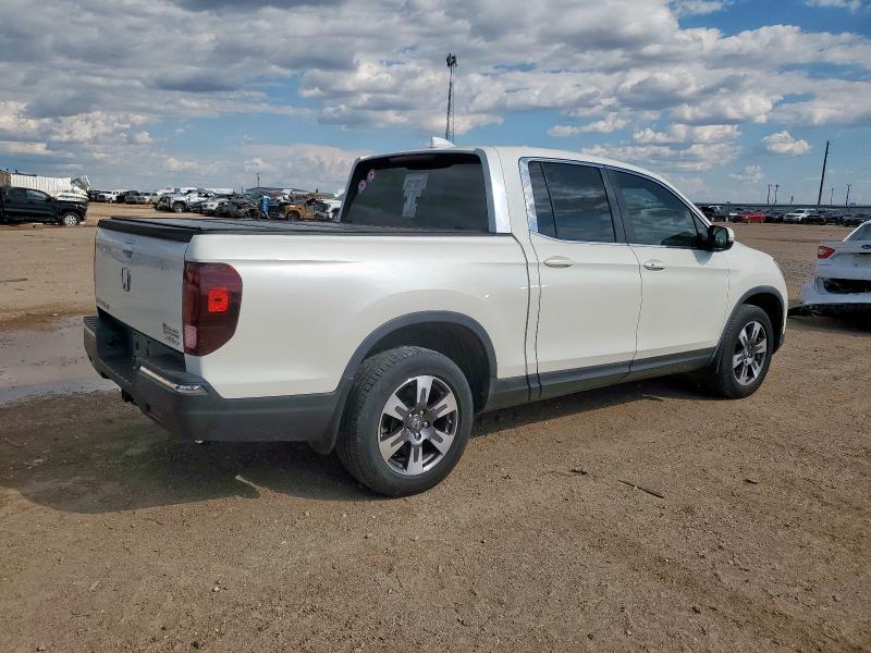 Photo 3 from auction – 2017 HONDA RIDGELINE with VIN 5FPYK3F56HB038290