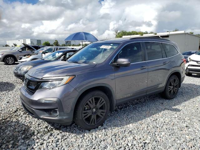 HONDA PILOT SE 2021 with VIN 5FNYF5H25MB027979 - Photo from auction