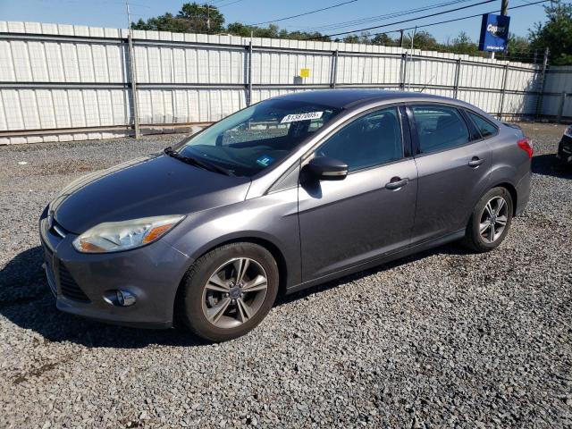 FORD FOCUS SE 2014 with VIN 1FADP3F23EL285246 - Photo from auction